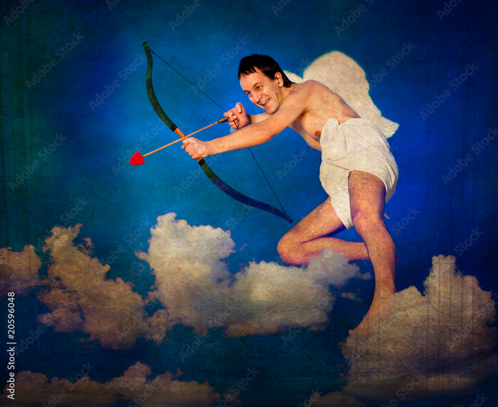 Flying Cupid on vintage postcard