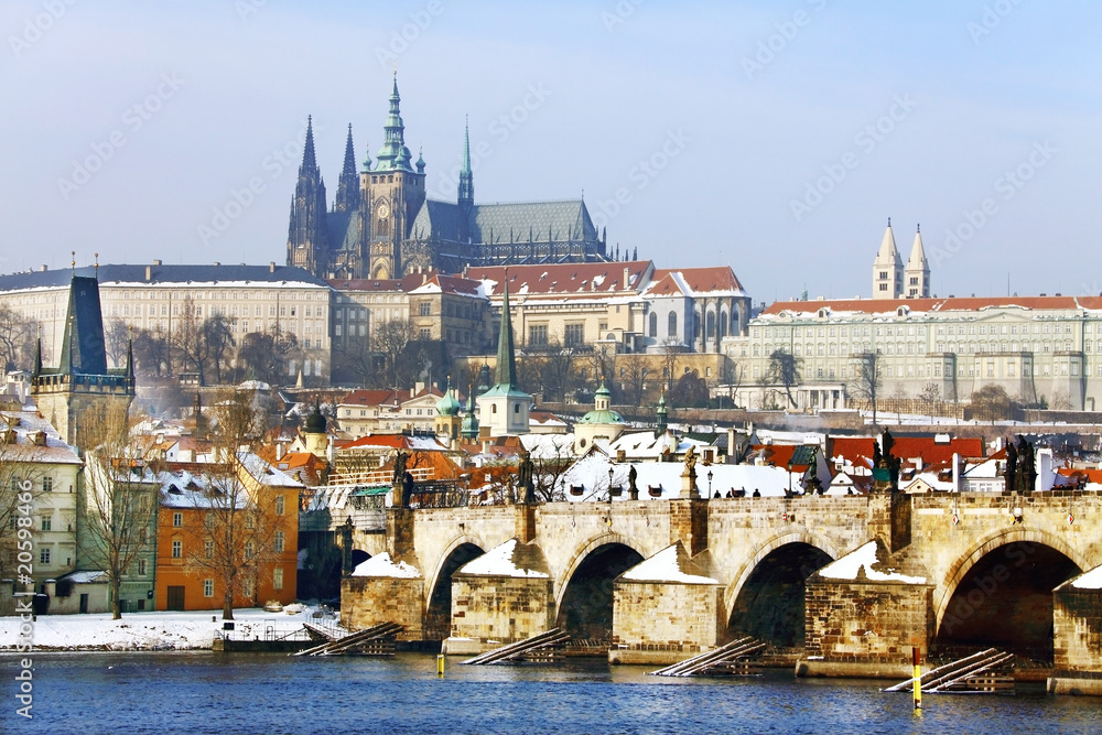 Frozen Snowy Prague gothic Castle  with Charles Bridge