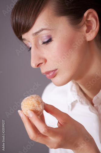 woman holding sweet cake