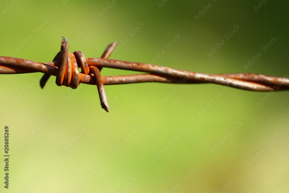 Close-up of old rusty twisted barbed wire. Close-up of old rusty twisted barbed wire.
