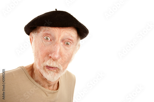 Foto Senior man in black beret