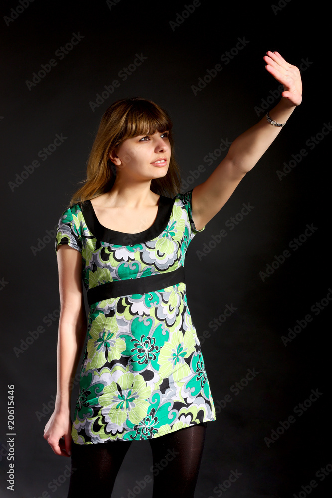 Fototapeta premium Girl hides from shiny light