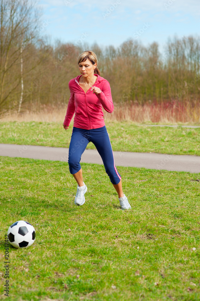Sportswoman Playing with a Ball Sportswoman Playing with a Ball