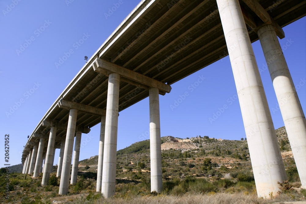 Low angle perspective view of a motorway road bridge Low angle perspective view of a motorway road bridge