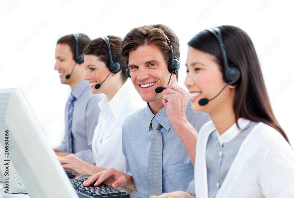Positive business people in a call center Positive business people in a call center