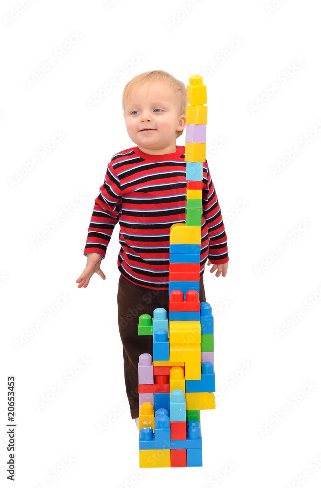 Baby boy playing with building blocks and smiling Baby boy playing with building blocks and smiling