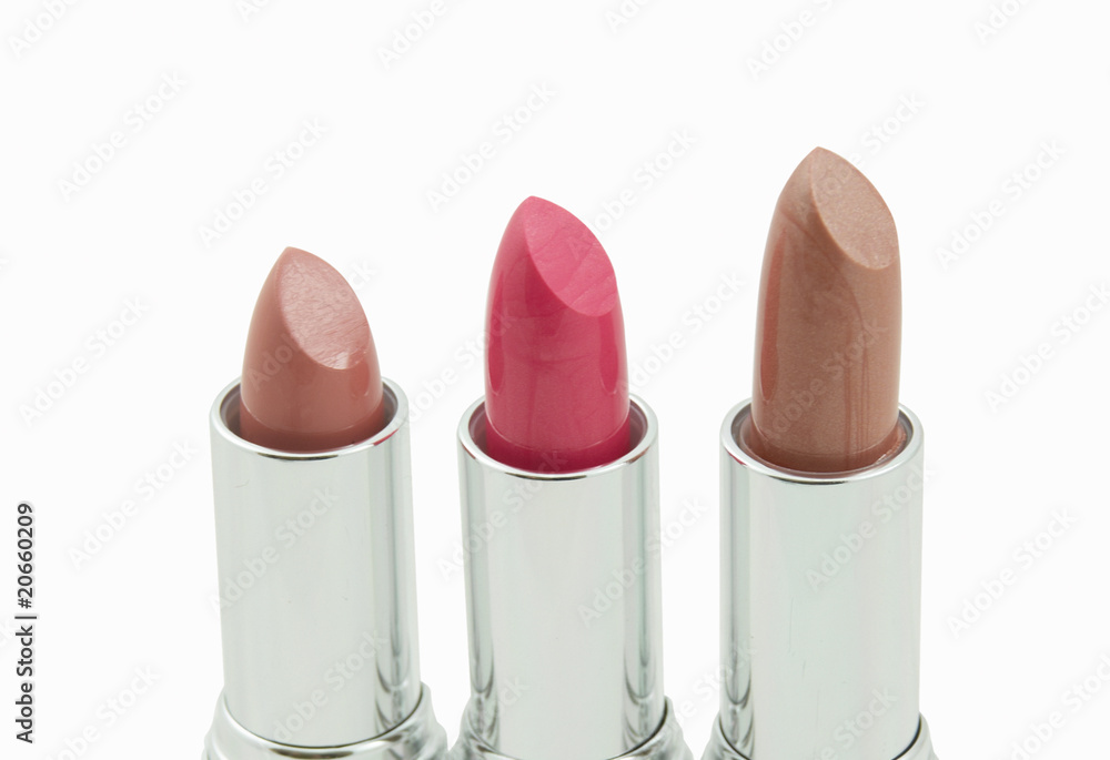 Three multicolored lipsticks Three multicolored lipsticks