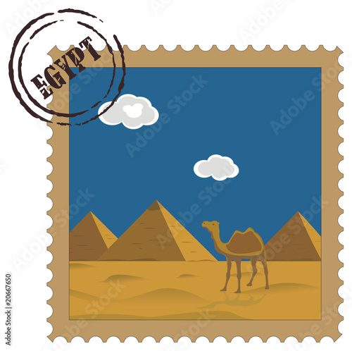 Old vintage postal stamp with Egyptian pyramids, famous landmark