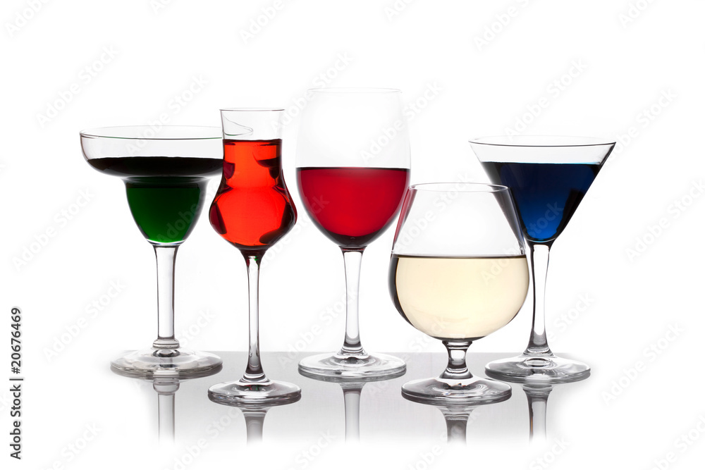 different colored drinks in wineglasses different colored drinks in wineglasses