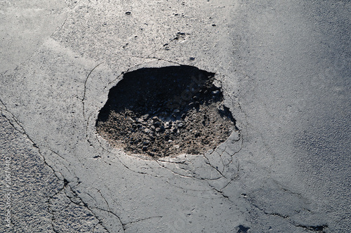 pothole in a road