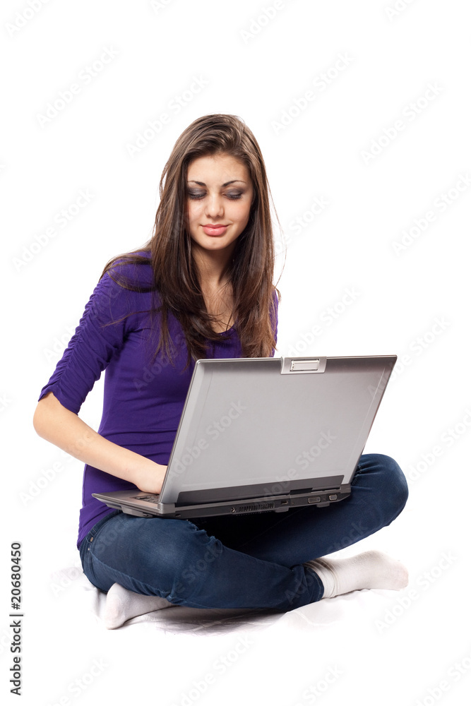 Brunette using laptop Brunette using laptop