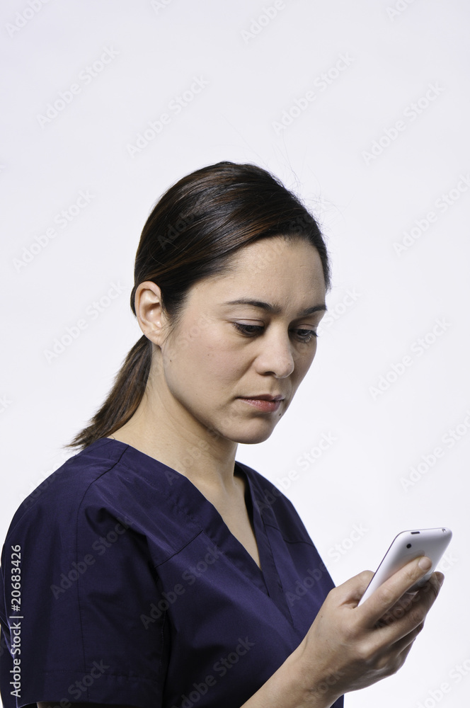 Medical lady checking her messages Medical lady checking her messages