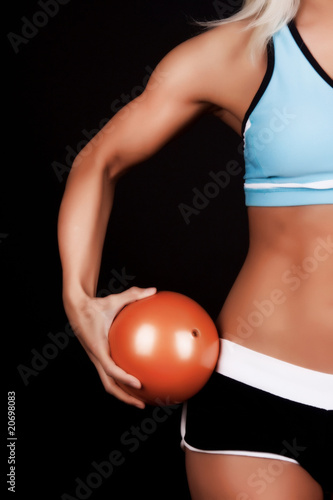 fitness ball in hands