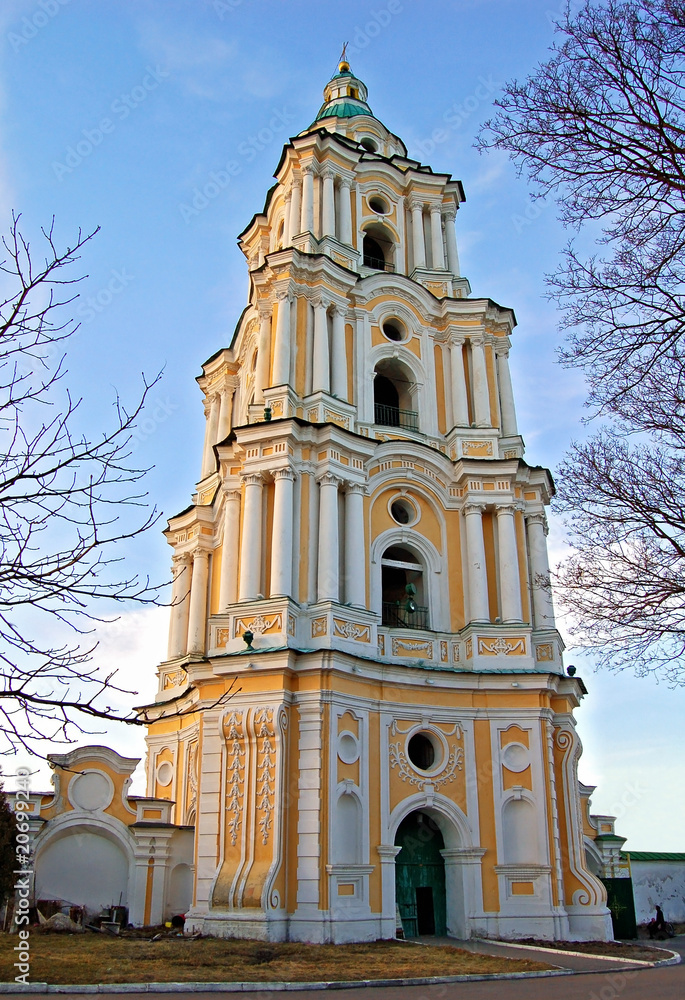 Antique stone baroque bell tower in Ukraine Antique stone baroque bell tower in Ukraine