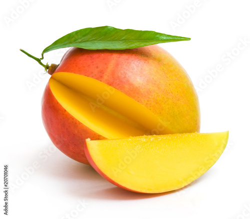 mango with a leaf and a slice