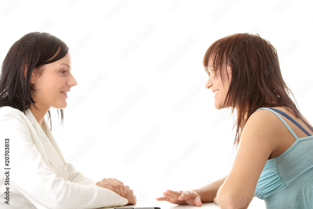 Happy young women friends talking Happy young women friends talking