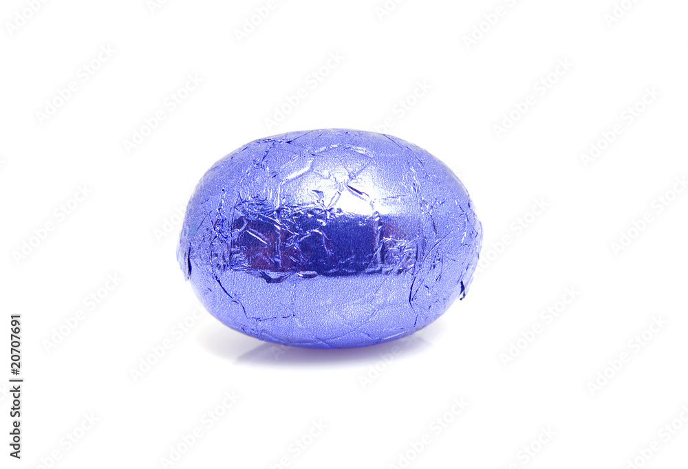one purple chocolate easter egg over white background one purple chocolate easter egg over white background