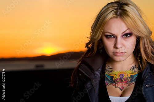 Intense Blond Tattoo Girl