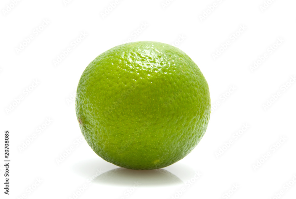 Fresh green lime over white background Fresh green lime over white background