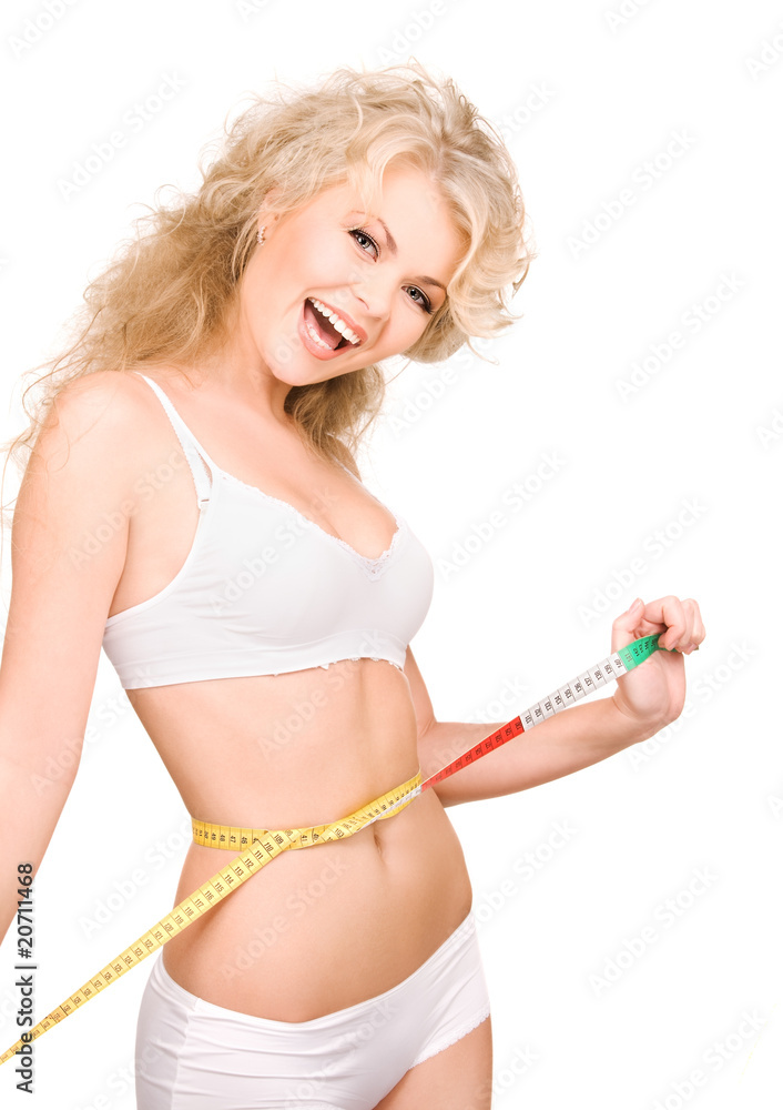 young beautiful woman with measure tape young beautiful woman with measure tape