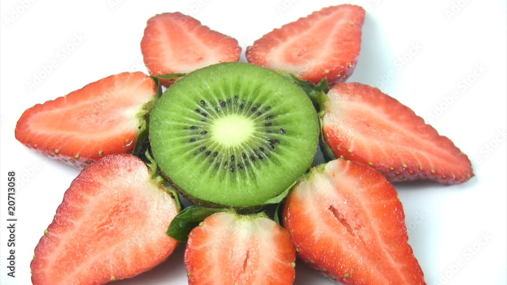 Fresh kiwi and strawberries spinning Fresh kiwi and strawberries spinning