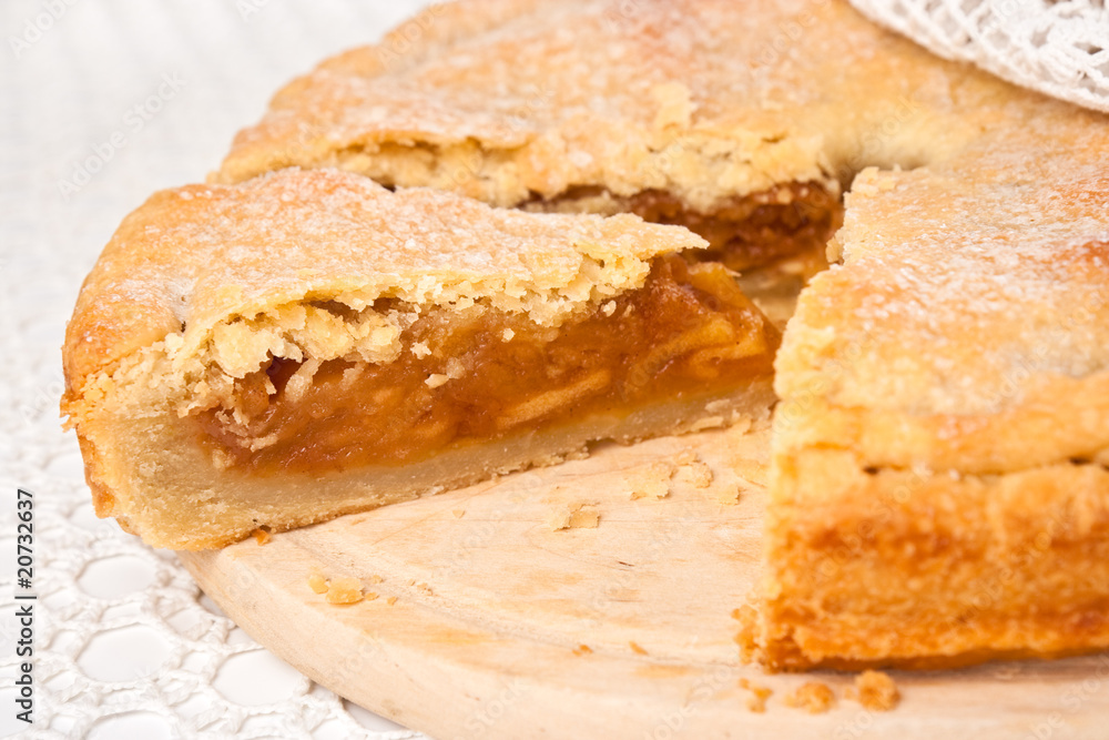 The cut off piece from an apple pie The cut off piece from an apple pie