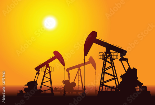 Vector silhouette of three oil rigs