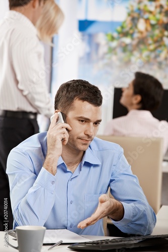 Businessman talking on mobile