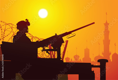 Vector silhouette of a soldier with a machine gun on the vehicle