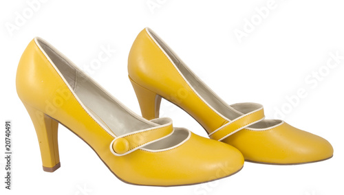 side view of female designer shoes on white background