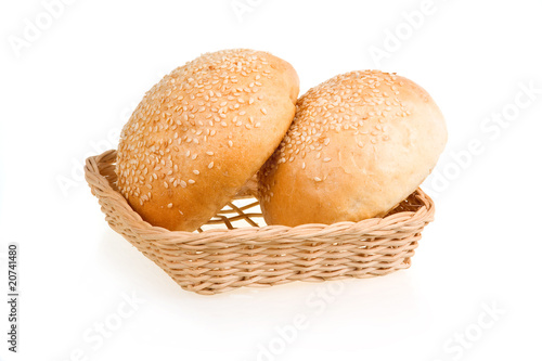 Two Baked Buns with Sesame in Basket