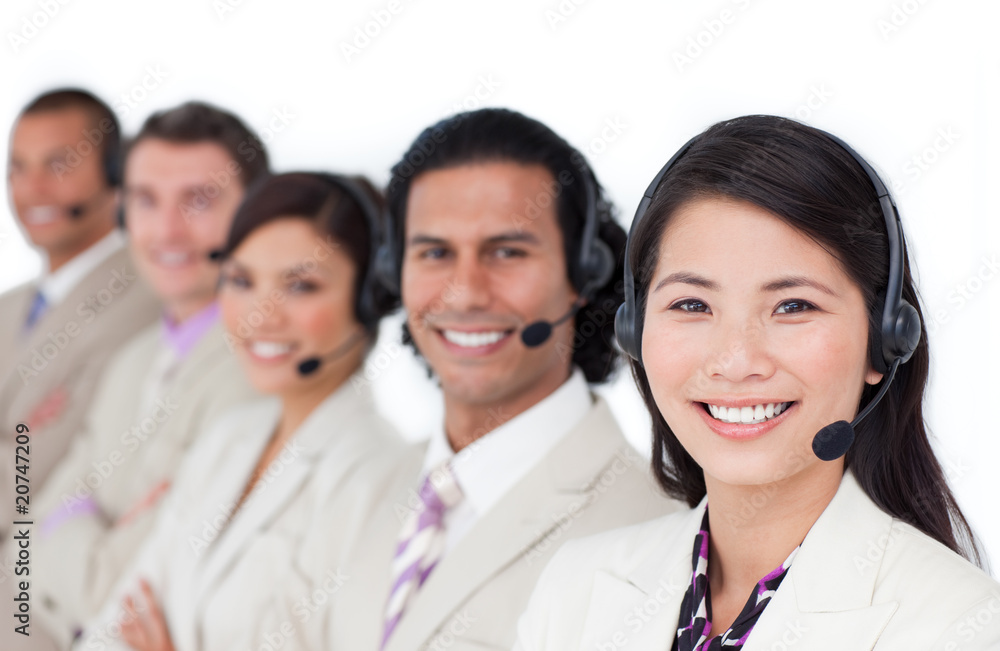 Enthusiastic business team lining up with headset on Enthusiastic business team lining up with headset on