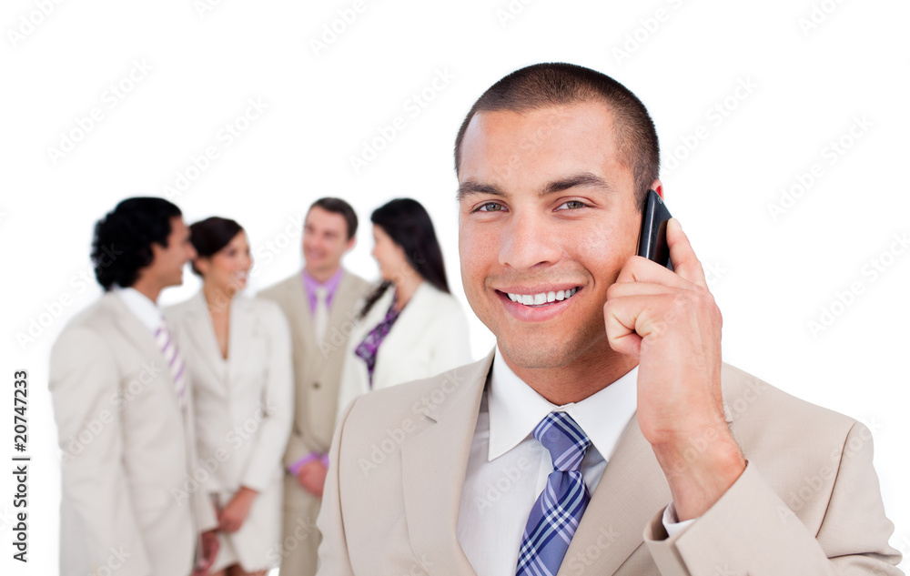 Portrait of caucasian businessman on phone with his team Portrait of caucasian businessman on phone with his team