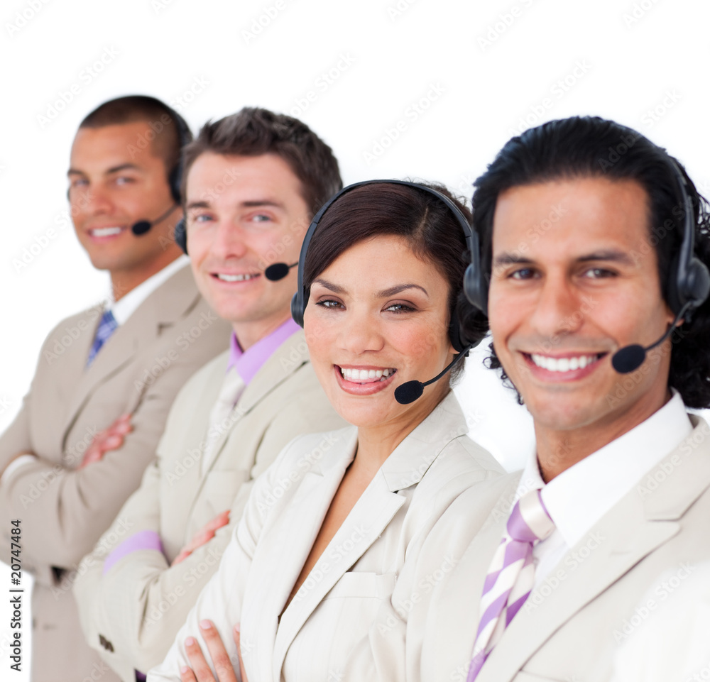 Smiling business team lining up with headset on Smiling business team lining up with headset on