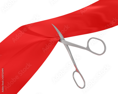 Manicure scissors cut the red ribbon