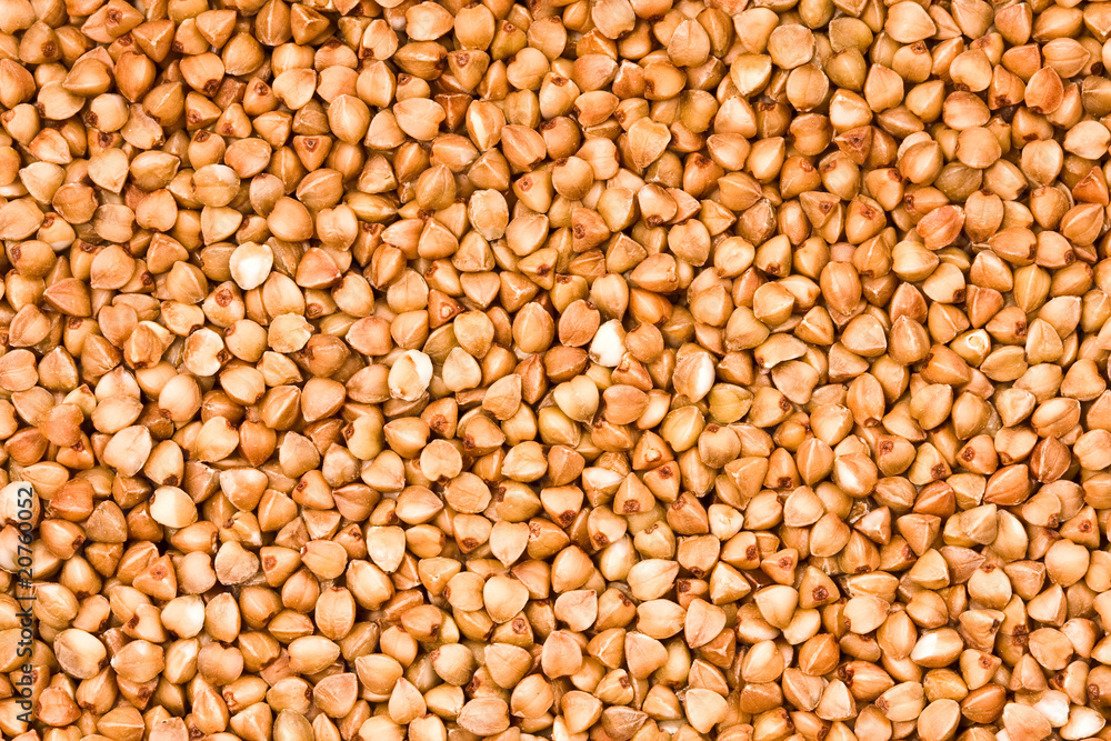 Buckwheat groats, close up, background Buckwheat groats, close up, background