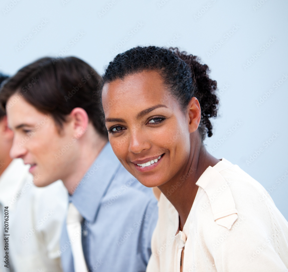 Smiling young business people at work Smiling young business people at work