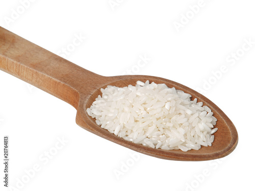 Wooden spoon with rice isolated on white background