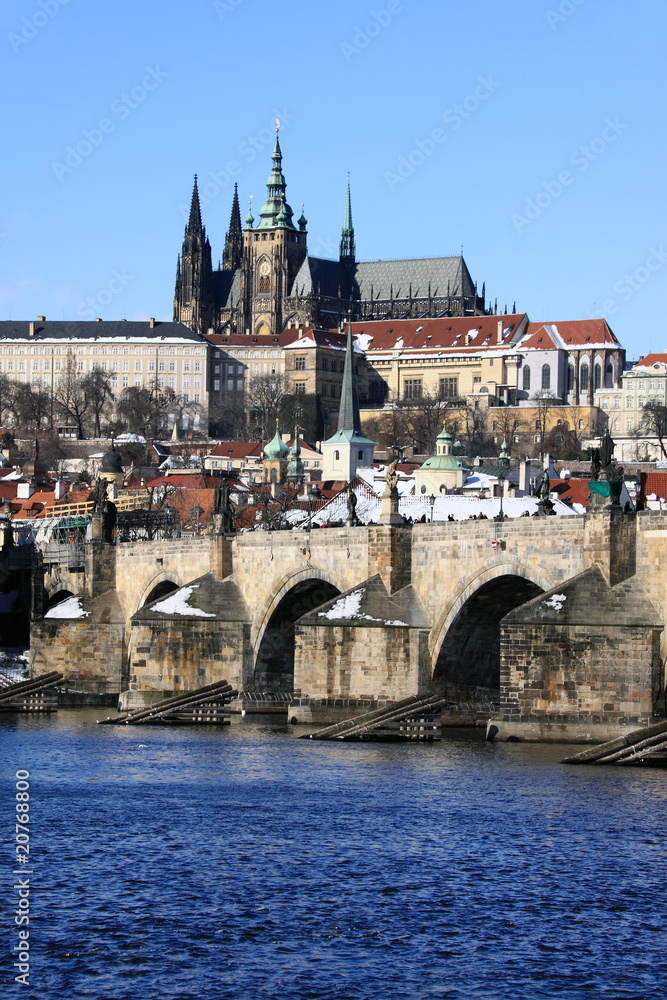 Frozen Snowy Prague gothic Castle above the River Vltava