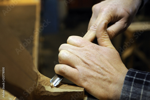 carpenter at work on wood