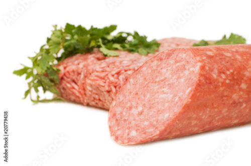 Forcemeat and sausage isolated on white background