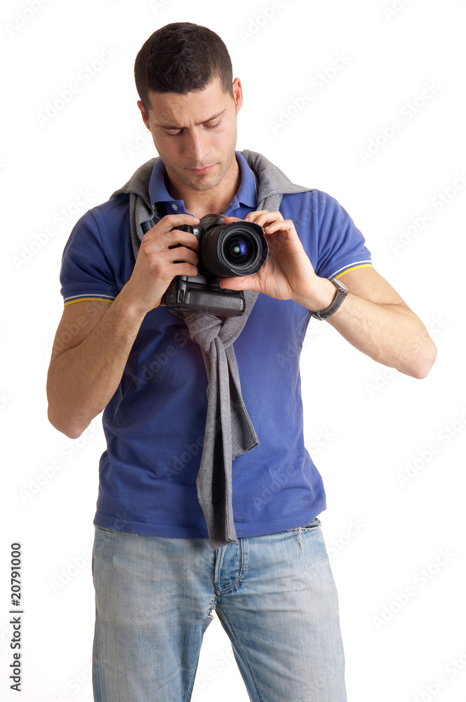 Obraz premium fotografo che regola la fotocamera