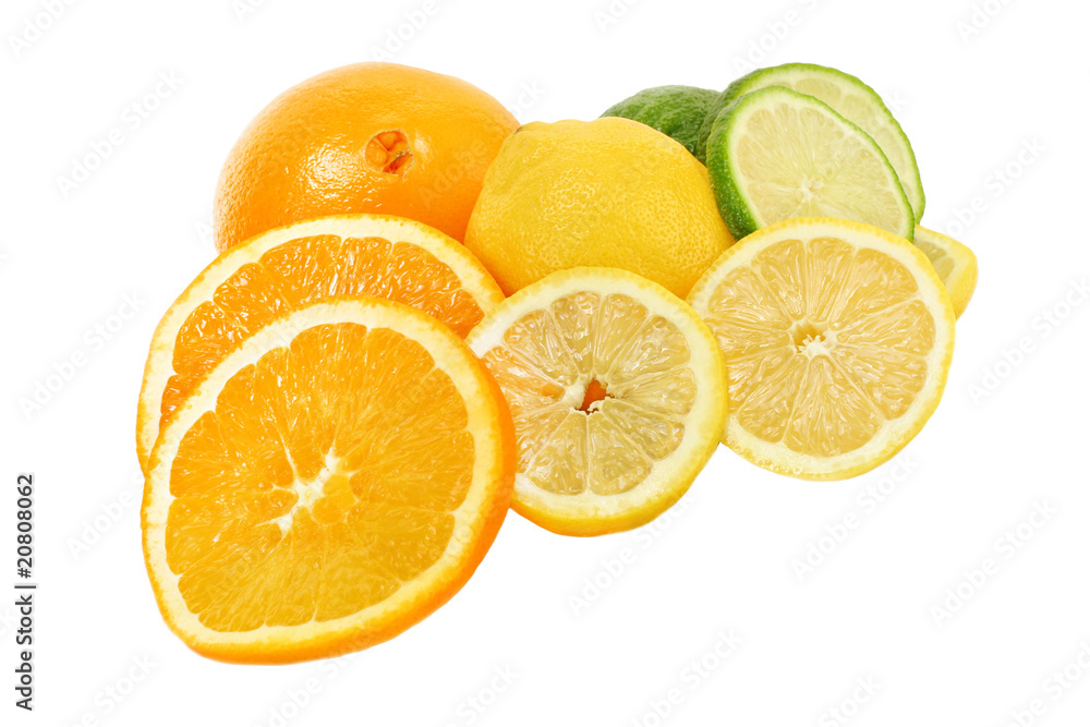 Assorted healthy vitamin C rich fresh citrus fruits on white.