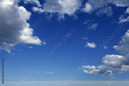 Blue beautiful sky with white clouds  in sunny day © lunamarina