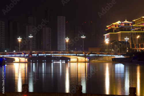 Bridge and buildings with Neon Light at night