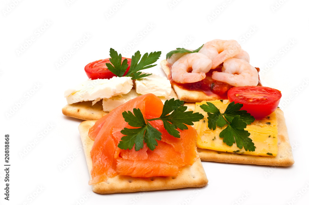 Cheese, salmon, prawns on crackers Cheese, salmon, prawns on crackers