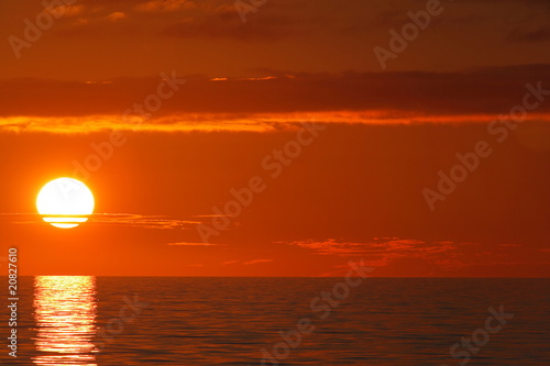 Fototapeta Naklejka Na Ścianę i Meble -  Sunset over Costa Rica. Sun reaching ocean