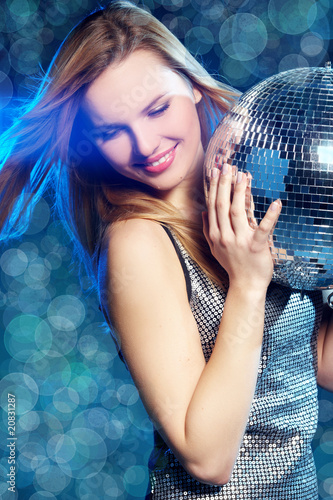 Woman with disco ball