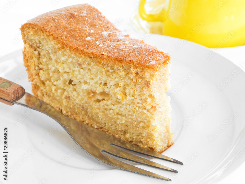 Fruit Cake Slice with fork at Breakfast.