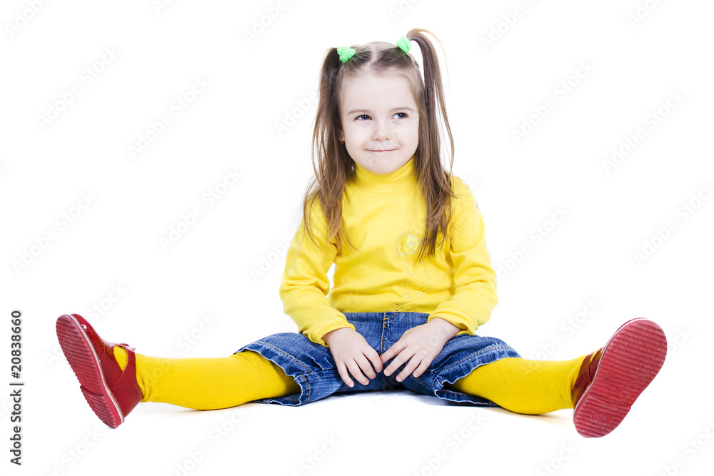 little girl is sitting on the floor isolated on white little girl is sitting on the floor isolated on white